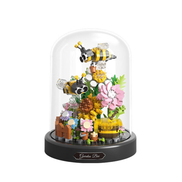 Assembling Micro-Particle Bee or Butterfly Building Blocks with Transparent Protection Cover